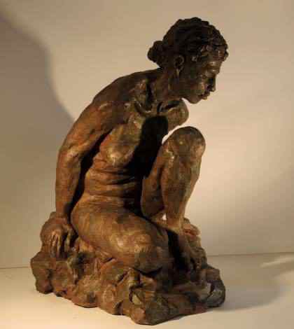 Claudia assise